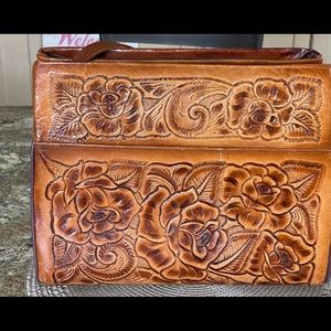 Tooled leather handbag